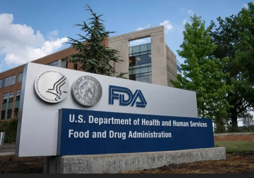 FDA headquarters sign with building background.